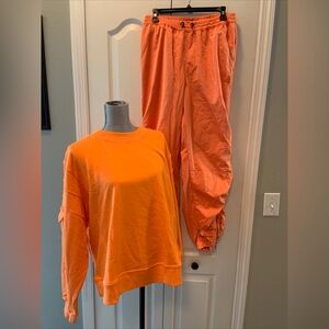 Free people movement ladies 2 piece orange outfit size small